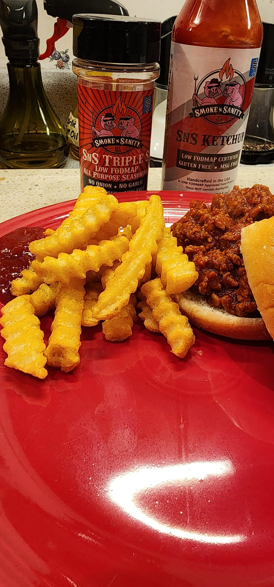 Plate with a sloppy joe sandwich and french fries