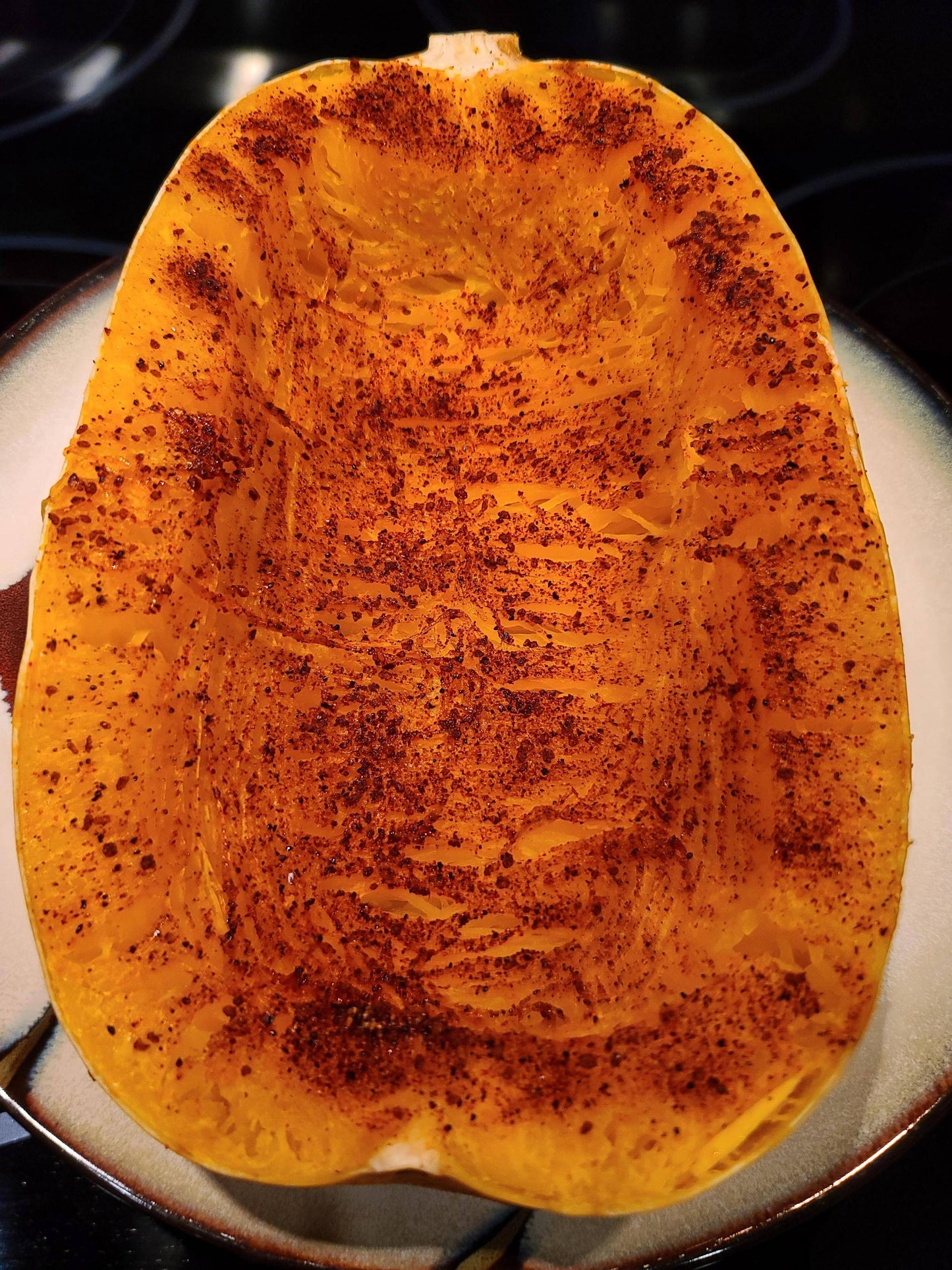 Cooked spaghetti squash topped with Sweet Maple Dust Seasoning