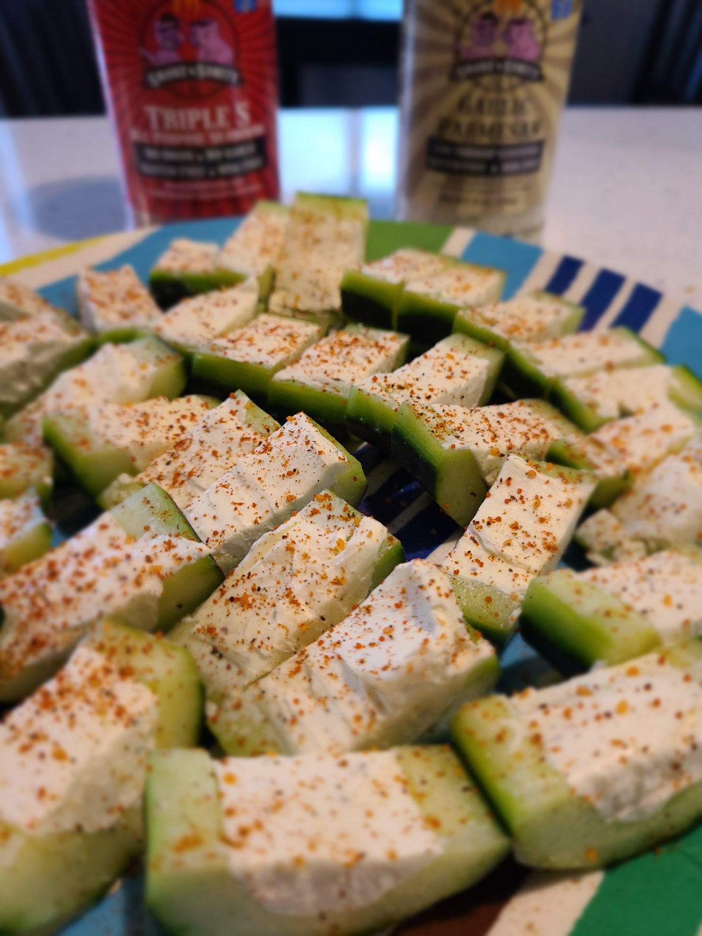Plate of cream cheese cucumber bites