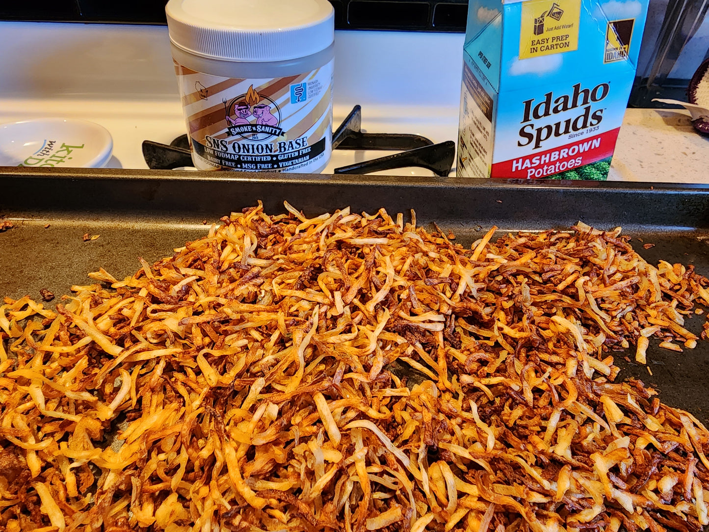 Cookie sheet full of baked hashbrowns