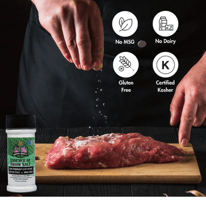 Picture of person seasoning meat, a bottle of Essence of Onion Salt, no msg, no dairy, gluten free, certified kosher.