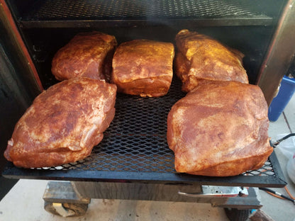 SnS Triple S All Purpose Seasoned Pork butts in a smoker